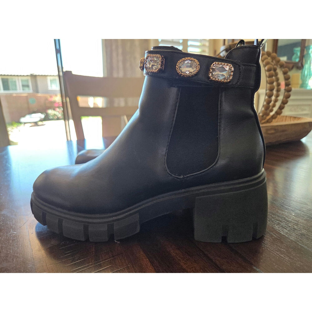 Steve Maden Amulet booties.
 Size 9